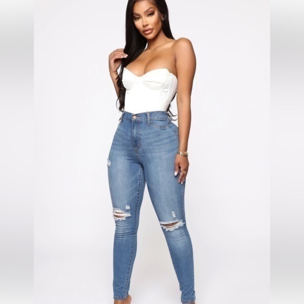 Woman High Rise Distressed Straight Leg Jeans